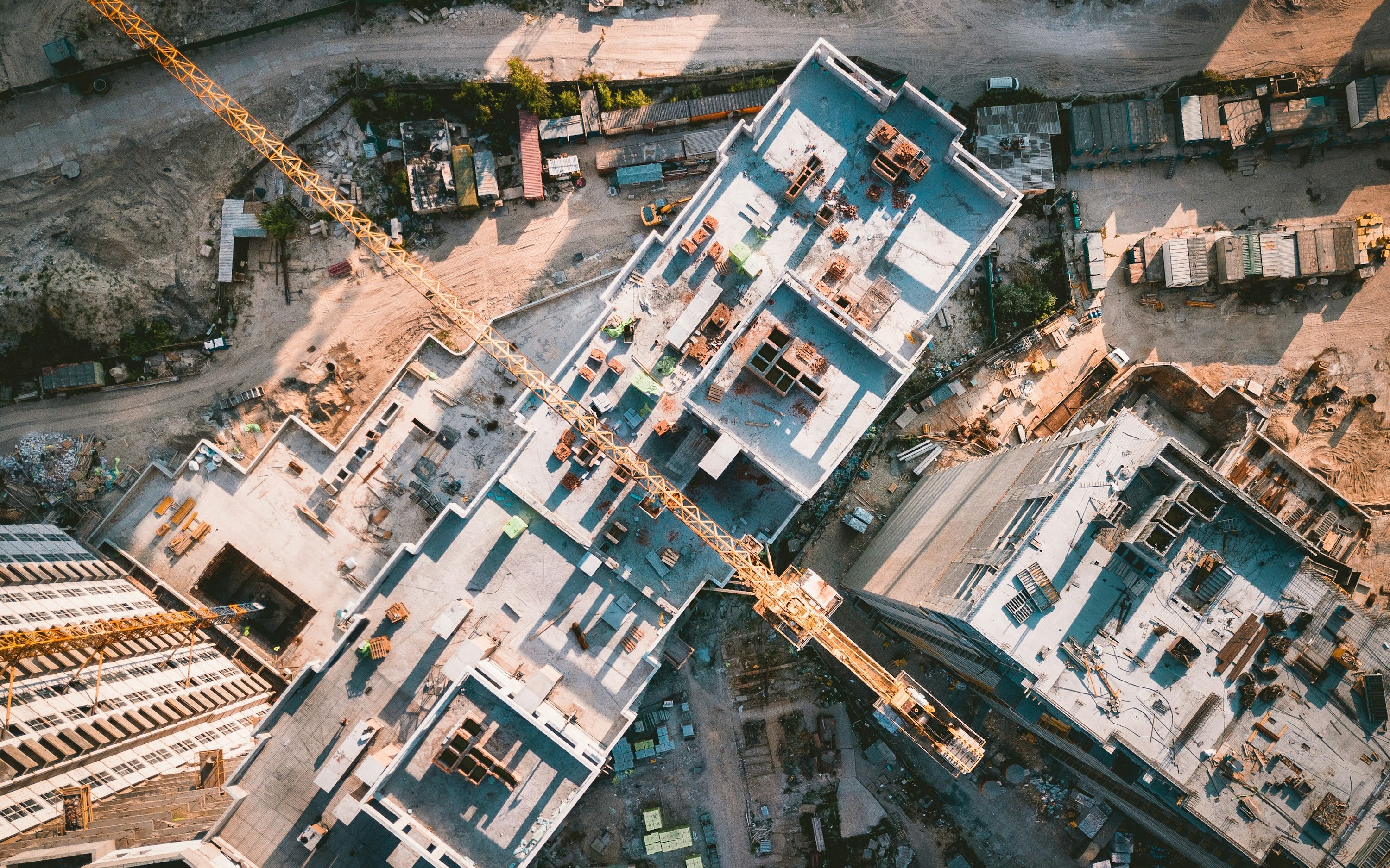 Aerial view of large-scale construction site showing project complexity
